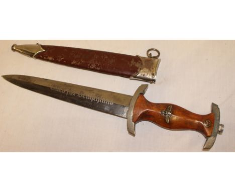 An original Second War German SA dagger, 1933 -1935 with double edged steel blade by Gust. Haker of Solingen with traditional