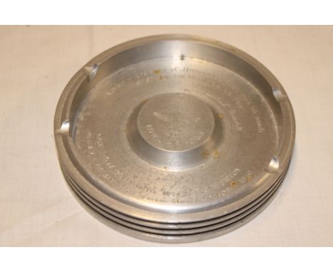 An aluminium piston ring ashtray "Made from a Rolls Royce Merlin engine piston as used in the Battle of Britain August/Octobe