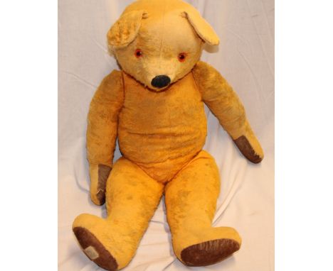 An old Chad Valley straw filled plush covered teddy bear, 26" long 