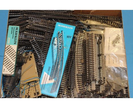 A large selection of various Marklin HO gauge railway track and accessories 