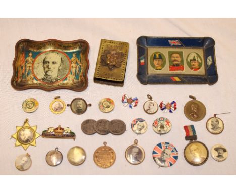 A selection of Boer War related patriotic badges and memorabilia including brass match holder with East Surrey Regiment South