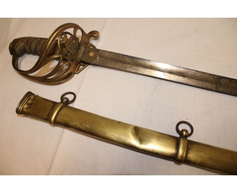 A Victorian Infantry officer's sword with etched steel blade by J. Jones of Regent Street, London, brass guard and wire bound