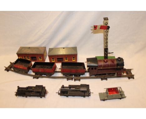 A Hornby type 501 O gauge reversing tank engine, a selection of various track and goods wagons together with two  Hornby OO g