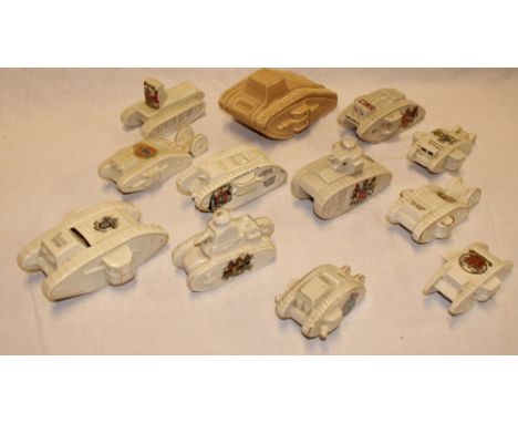 A collection of eleven souvenir crested china figures of First War tanks including HMLS, tank bank, HM Whippet tank and other