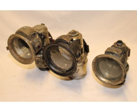 Three various old motorcycle carbide lamps including The Revenge, Miller and Lucas (3)