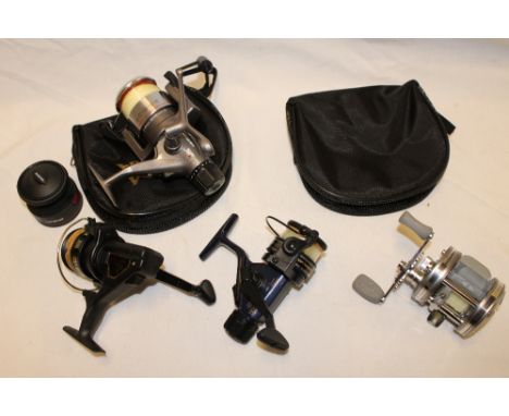 A modern Abu Garcia fixed spool reel; Ambassadeur 5600AB  multiplying reel and two other small fixed spool reels including No