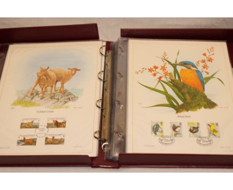 A limited edition first day lithograph album of Channel Island and Isle of Man stamps