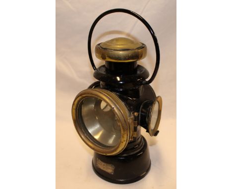 An old brass mounted painted metal Lucas King of the Road No. 431 vehicle lamp, 12½" high 