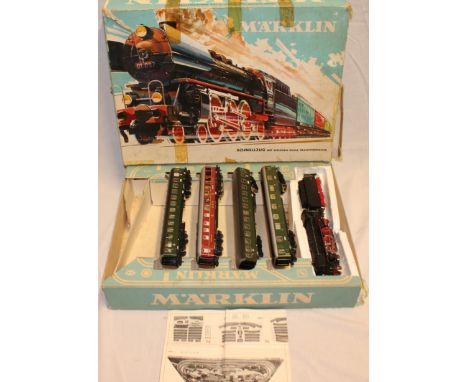 A Marklin HO gauge 3148 train set comprising 4-6-2 locomotive and tender and four carriages in original box (minus track) 