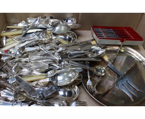 A large quantity of silver-plated flatware, including Lambert & Blaber reed and shell pattern, together with a plated circula