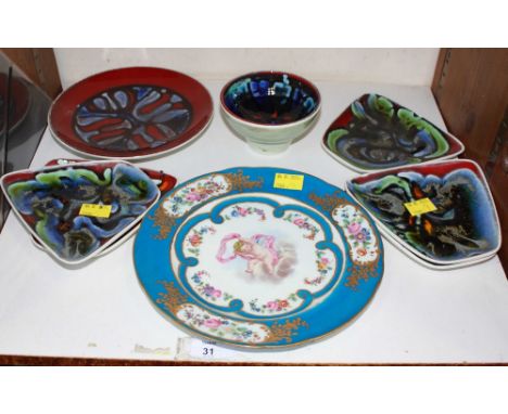 SECTION 31.  A Sevres blue, floral and gilt cabinet plate, together with six Poole pottery dishes and a Poole pottery bowl.