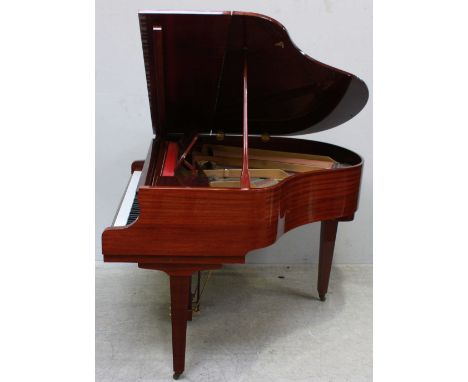 A Reid-Sohn Imperial German Scale Baby Grand Piano, in mahogany case, raised on square tapering supports, gilt cast iron fram