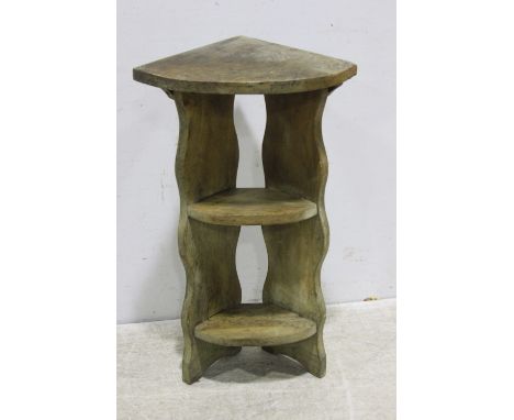 An Arts & Crafts elm standing corner shelf, with shaped sides, and tusk tenons.