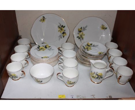 SECTION 4.  A Royal Grafton yellow rose painted double tea service.