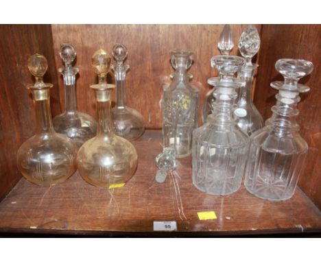 Section 55.  A pair of late Georgian decanters, of three-ring mallet form with mushroom stoppers and plain paneled body, toge