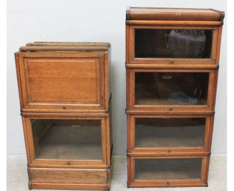 Two narrow Globe Wernicke bookcase sections, one glazed one paneled, together with four glazed shallow Globe Wernicke section