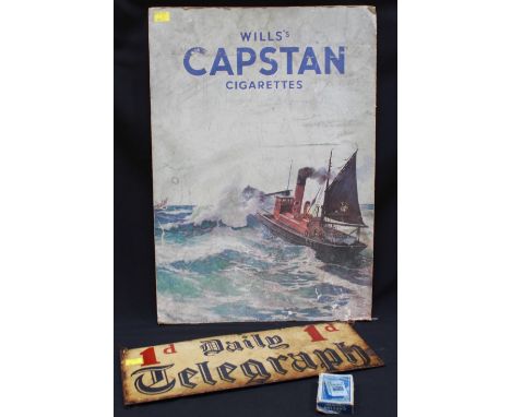A enamel advertising sign for "Daily Telegraph," 19x50cm, together with a hardboard advertising sign for "Wills Capstan Cigar