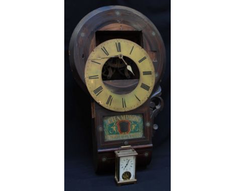 A "Superior Regulator" circular wall clock with circular dial and painted glass pendulum door, (for restoration), together wi