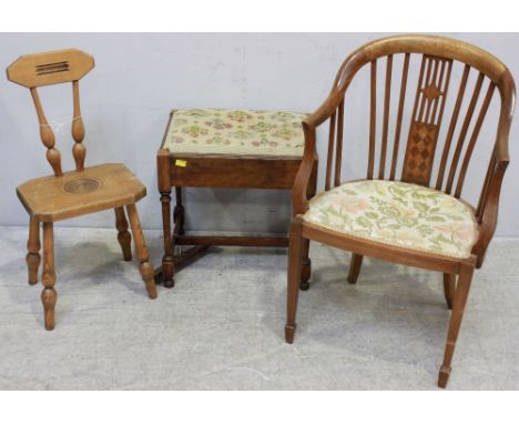 An Edwardian faded mahogany stick-back tub chair, together with a beechwood stool and early 20th century piano stool with flo