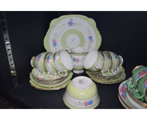 A vintage Royal Standard bone china part tea set, containing cups and saucers, milk jug and sugar basin amogst other items, h