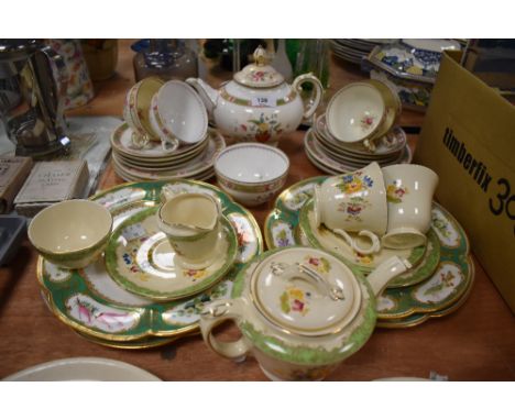 A Burleigh Tea pot, sugar basin, plate, milk jug and cups and saucers having bright floral transfer pattern, also included ar