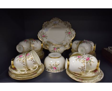 A vintage part tea set having gilt leaf pattern and edging with rose detailing, Plant Tuscan china Made in England, comprisin