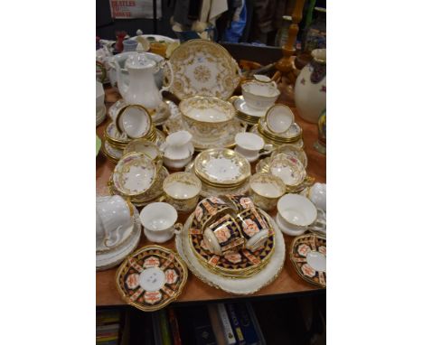 A collection of part tea services, including Floral Cauldon having gilt edging and selection of Davenport in Imari palette.
D
