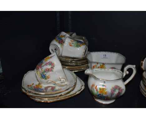 A vintage Standard china part tea set, containing cups and saucers, milk jug and sugar basin, having transfer pattern of gard