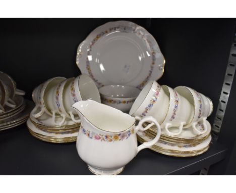 A Duchess bone china England 'Meadowsweet' part tea set having transfer floral print and gilt edging includes cake plate, cup