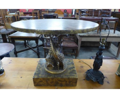 A gilt occasional table and a figural table lamp 