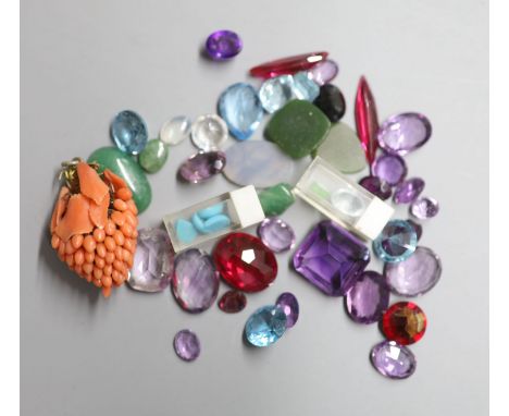 A small quantity of unmounted cut gemstones, including amethyst, aquamarine and synthetic blue spinel.