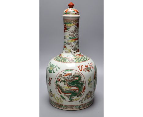 A Chinese famille rose 'dragon and phoenix' bottle vase and cover, 42cm