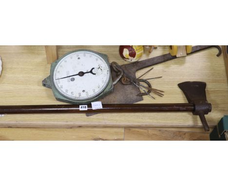 Items from an abbatoir; a twin head axe, iron chopper, a set of Salter scales and a meat skewer