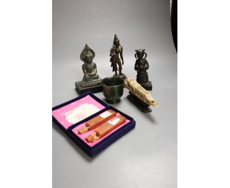 An Asian bronze Buddha, Ming bronze figure fragment and an Indian bronze figure, a hardstone cup, soapstone seals etc, talles