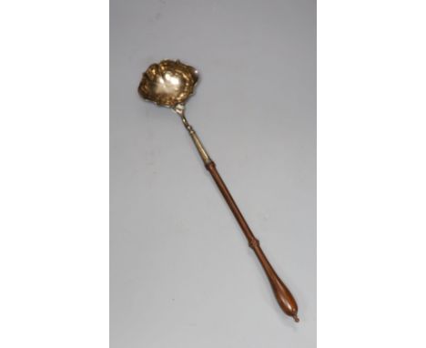 A George II silver toddy ladle, with turned wooden handle, John Pollock, London, 1742, 37.8cm, gross 81 grams.CONDITION: Engr