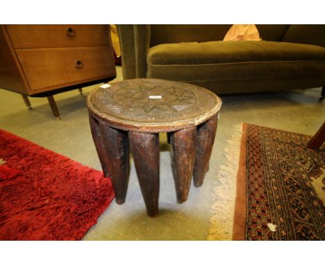 African 11-legged carved round stool