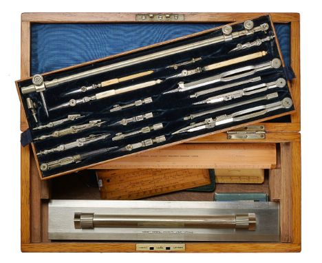 ϒA late Victorian oak magazine of draughtsman’s drawing instruments, W.F. Stanley, London, circa 1890 The interior with moire