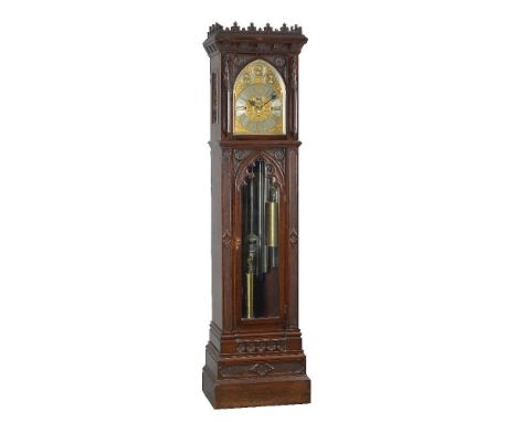 An impressive late Victorian Gothic revival carved mahogany quarter-chiming longcase regulator, unsigned, circa 1890-1900   T