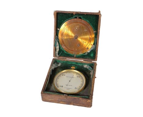 A gilt brass aneroid barometer and a brass weather forecasting calculator, Negretti and Zambra, London, early 20th century   