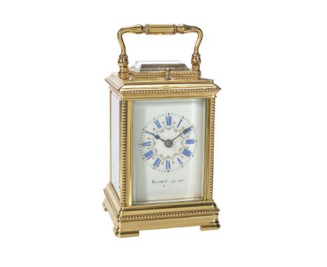 A French small lacquered brass carriage clock with push-button repeat, indistinctly signed, circa 1900   The eight-day gong s