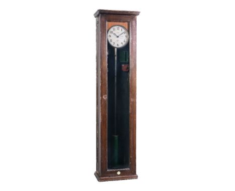 A mahogany Pulsynetic C-7 electromagnetic pendulum master clock, Gents, Leicester, circa 1927   The movement with green paint