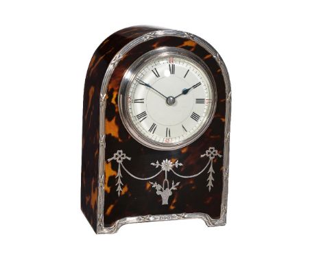 ϒAn Edwardian silver mounted tortoiseshell small desk timepiece, the case stamped for Hardy Brothers, Chester 1907 The French