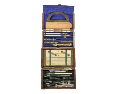 ϒA walnut cased set of drawing instruments, signed for Grayson, mid 19th century The interior with green moire silk lid appli
