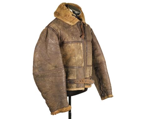 Flying Jacket. A WWII RAF Irvin brown leather flying jacket, fur lined, multi-panel construction, Dot zips, waistbelt, zips a