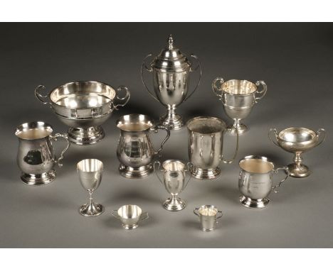 The John Spiller Trophy Collection. A collection of aviation prize trophies, including a miniature trophy by Wakely &amp; Whe