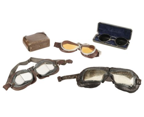 Flying Goggles. A pair of WWII Mk III flying goggles, with celluloid lenses, narrowed black metal frames, oversized brown lea