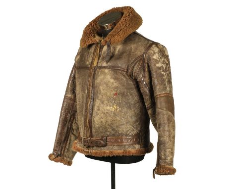Flying Jacket. A WWII Irvin flying jacket, brown leather with fur lining, traces of coloured artwork to the left panel, Air M