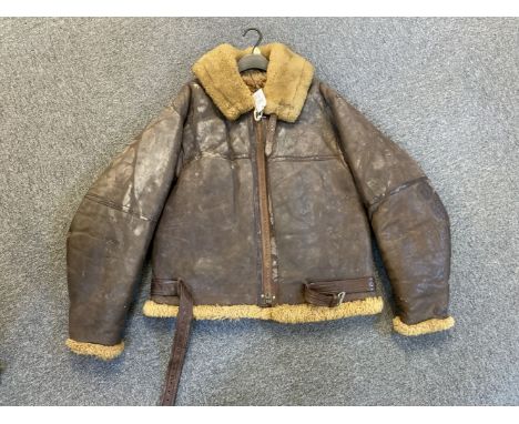 Flying Jacket. A WWII RAF Irvin brown leather flying jacket, fur lined with Air Ministry tailors label stamped 'Size 5, Heigh