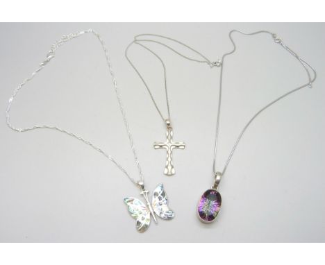 Three silver pendants including mystic topaz, 3.8cm, two silver chains and one plated chain