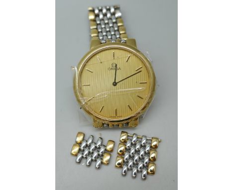 An Omega De Ville gold plated stainless steel dress wristwatch, a/f, lacking crown, with paperwork dated 1989 and spare links